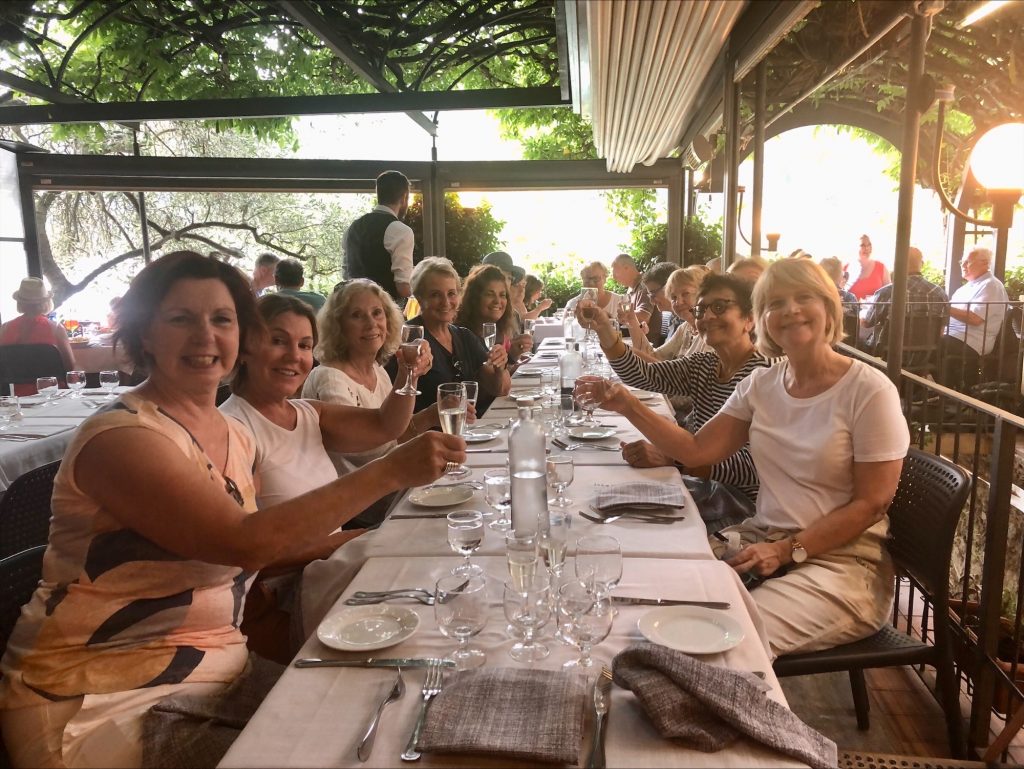 Award winning Women's Travel Group dining in Italy.